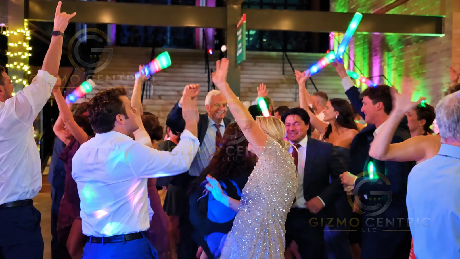 Guests filling a dance floor at an And We Danced event