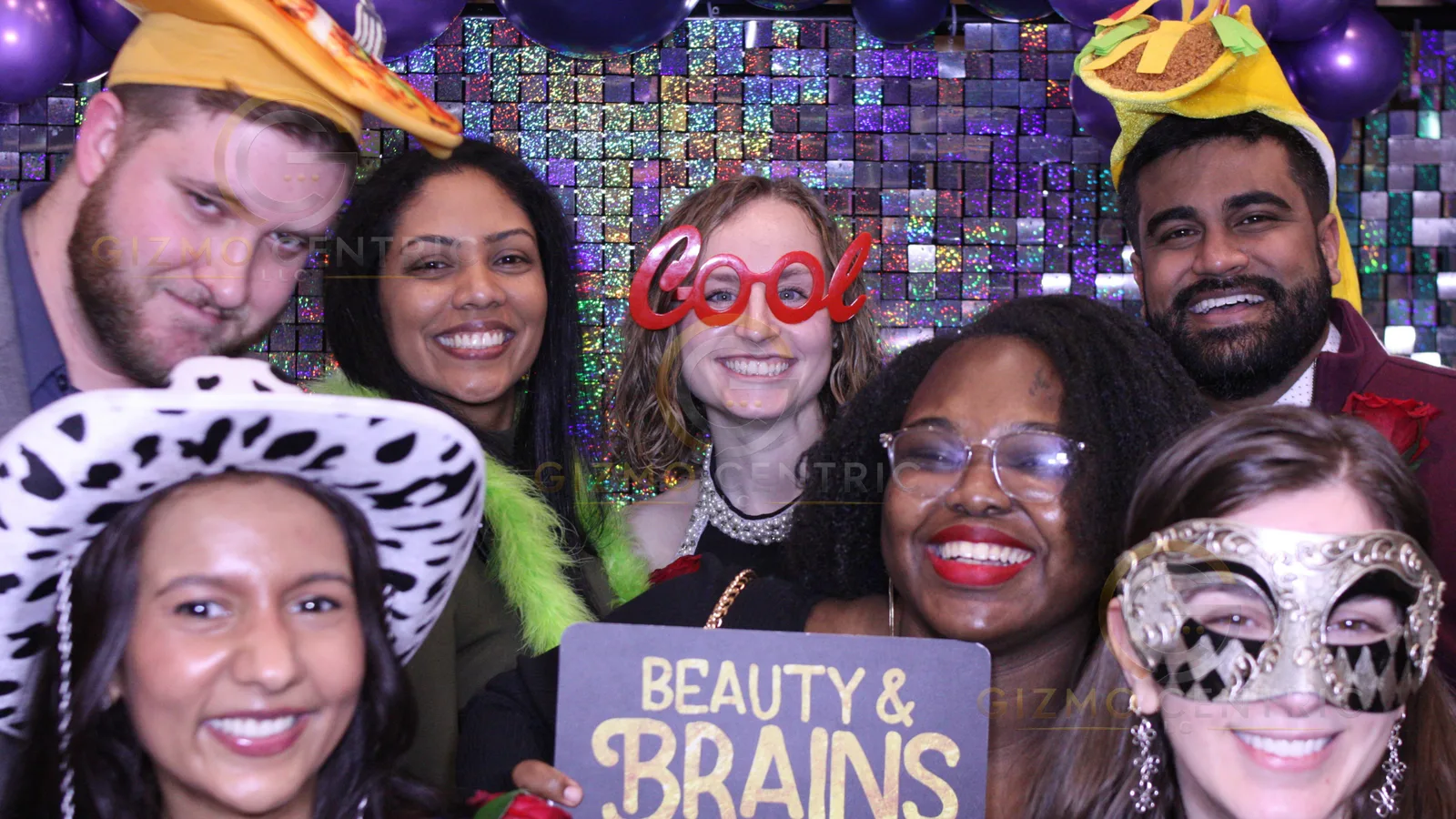 Guests having fun together in a Lotsa Laffs photo booth